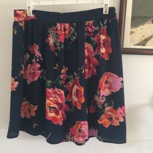 Francesca’s blue watercolor knee length skirt